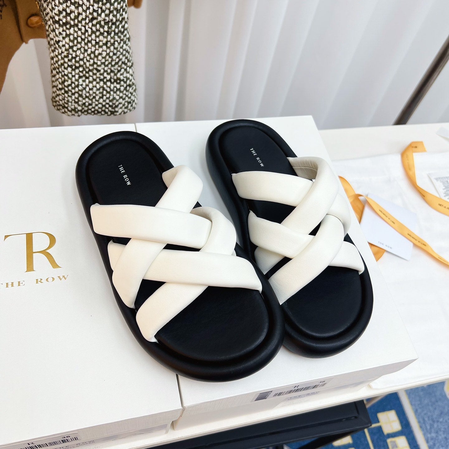 THE ROW 26S CROSSED PADDED SLIDES IN WHITE CALFSKIN