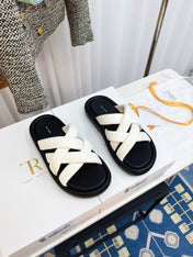 THE ROW 26S CROSSED PADDED SLIDES IN WHITE CALFSKIN