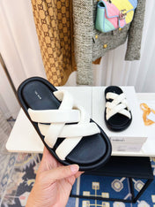 THE ROW 26S CROSSED PADDED SLIDES IN WHITE CALFSKIN
