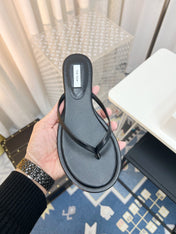 THE ROW 26S THONG SANDALS IN BLACK CALFSKIN