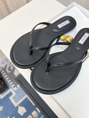 THE ROW 26S THONG SANDALS IN BLACK CALFSKIN