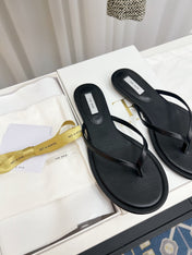 THE ROW 26S THONG SANDALS IN BLACK CALFSKIN