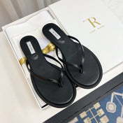 THE ROW 26S THONG SANDALS IN BLACK CALFSKIN