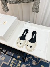 THE ROW 26S PIXEL APPLIQUE MULES IN IVORY WHITE CALFSKIN