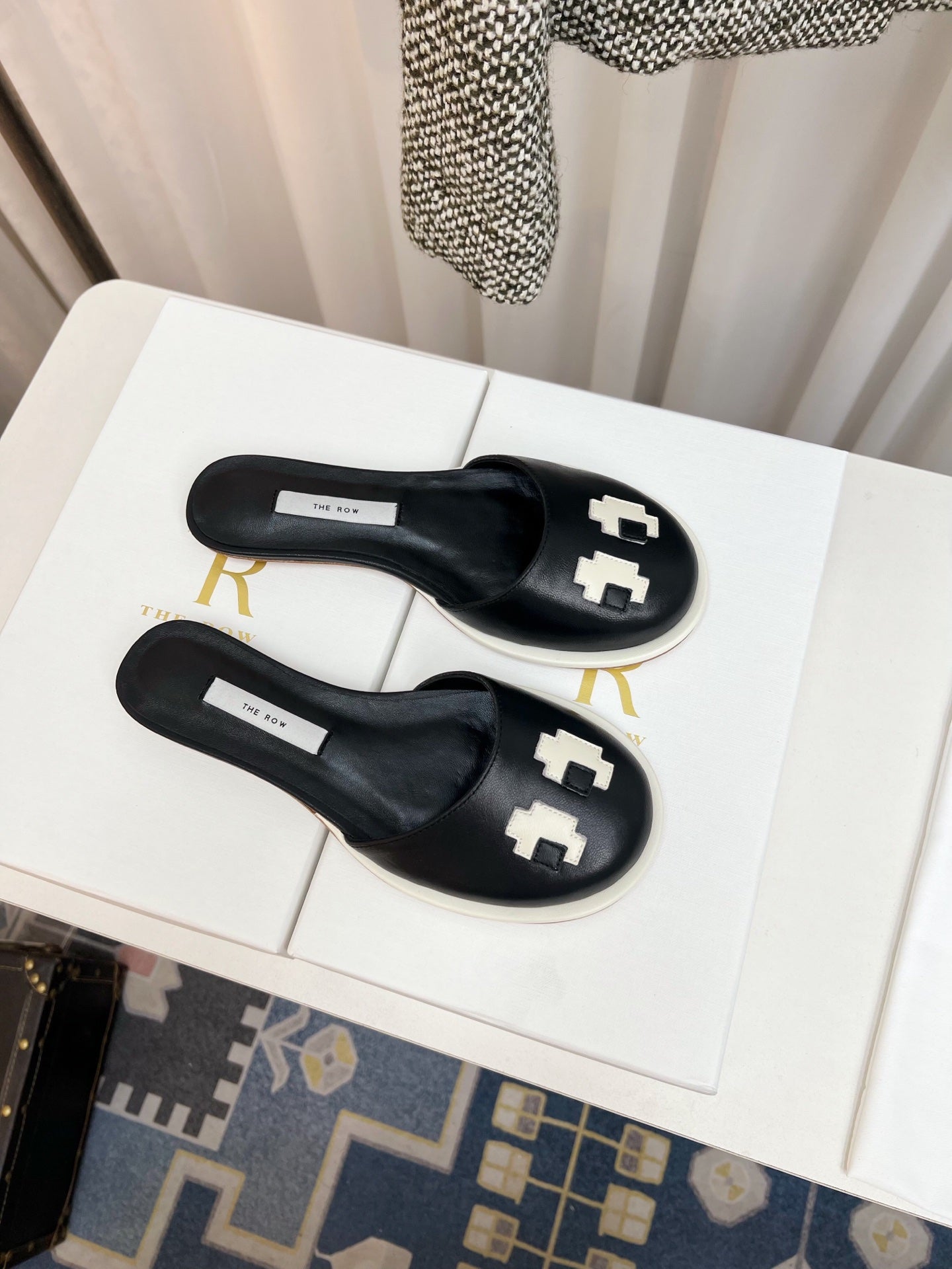 THE ROW 26S PIXEL APPLIQUE MULES IN BLACK CALFSKIN