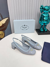 PRADA 26S ROUND TOE SLINGBACK PUMPS 40MM IN LIGHT BLUE CALFSKIN WITH BOW