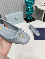 PRADA 26S ROUND TOE SLINGBACK PUMPS 40MM IN LIGHT BLUE CALFSKIN WITH BOW