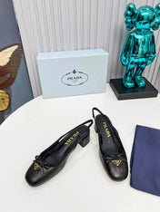 PRADA 26S ROUND TOE SLINGBACK PUMPS 40MM IN BLACK CALFSKIN WITH BOW