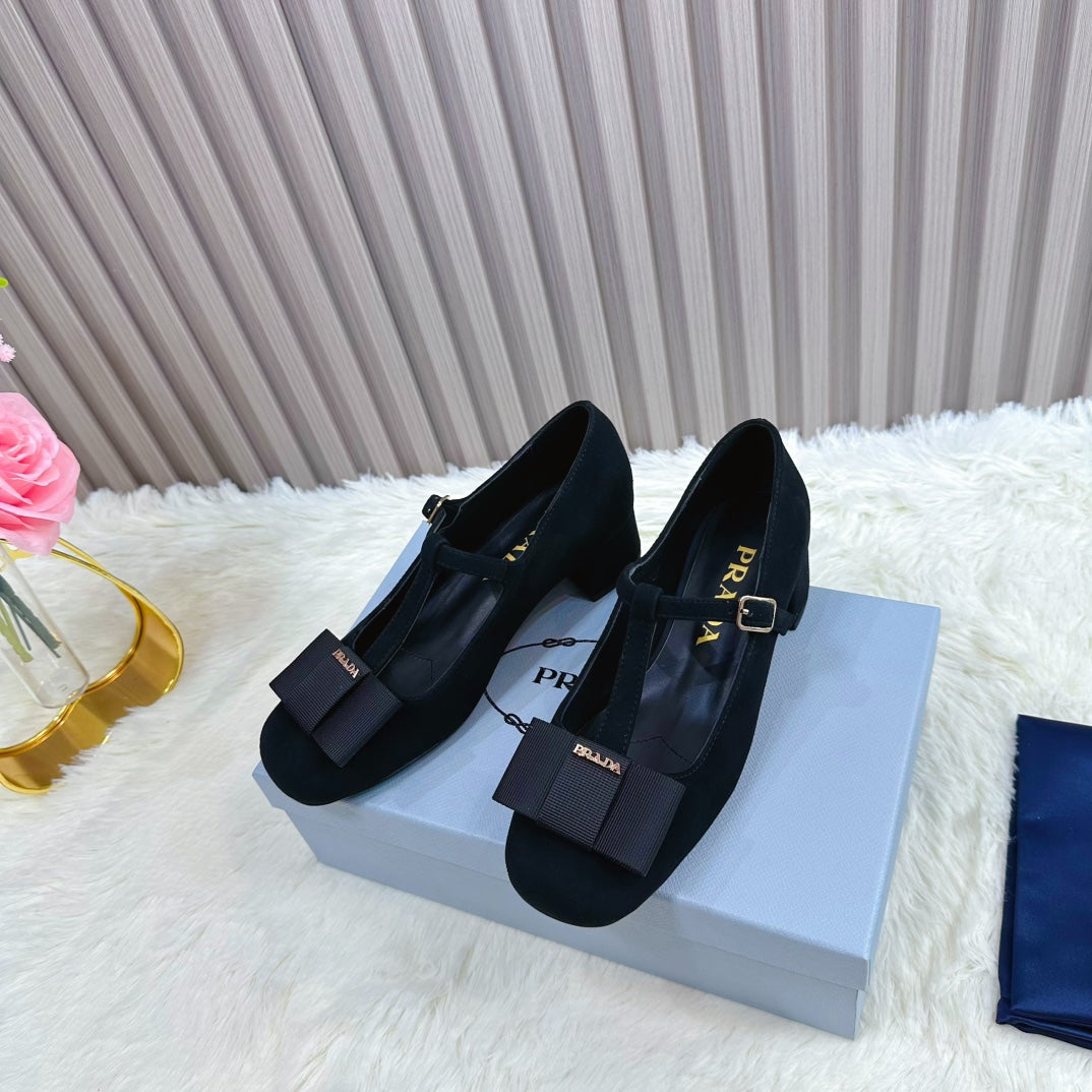 PRADA 26S T-STRAP MARY JANE PUMPS 40MM IN BLACK SUEDE WITH BOW