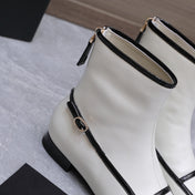CHANEL 26S ANKLE BOOTS IN WHITE CALFSKIN WITH BLACK PATENT LEATHER TRIM AND CC LOGO ON TOE CAP