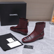 CHANEL 26S ANKLE BOOTS IN BURGUNDY CALFSKIN WITH BLACK PATENT LEATHER TRIM AND CC LOGO ON TOE CAP