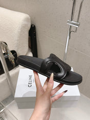 CELINE 26S TRIOMPHE SLIDES IN BLACK CALFSKIN
