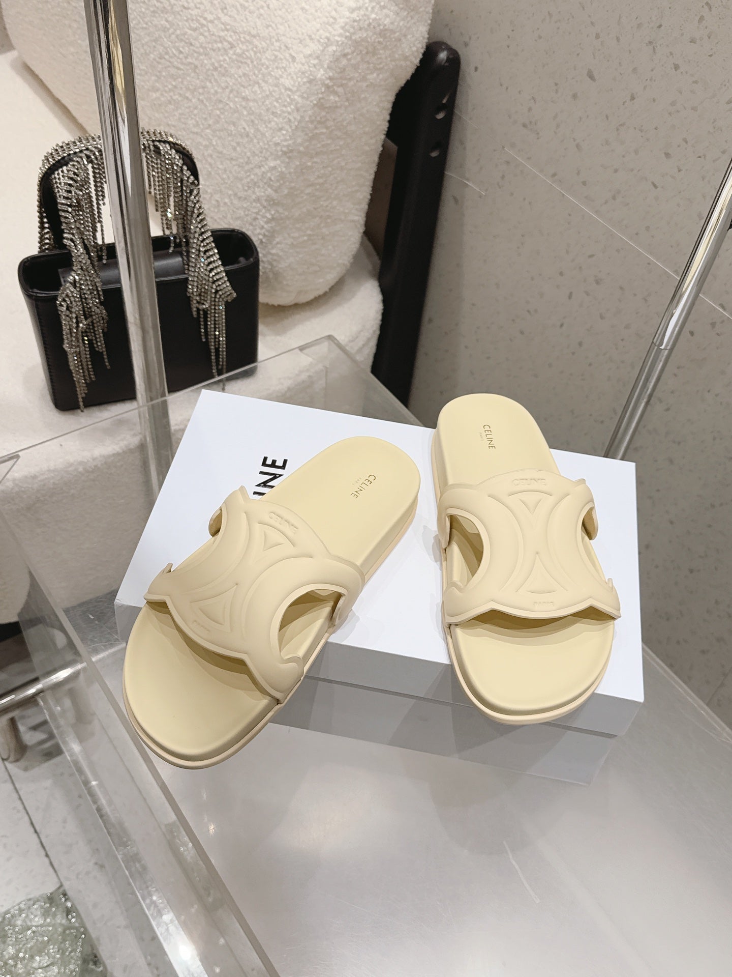 CELINE 26S TRIOMPHE SLIDES IN PASTEL YELLOW CALFSKIN