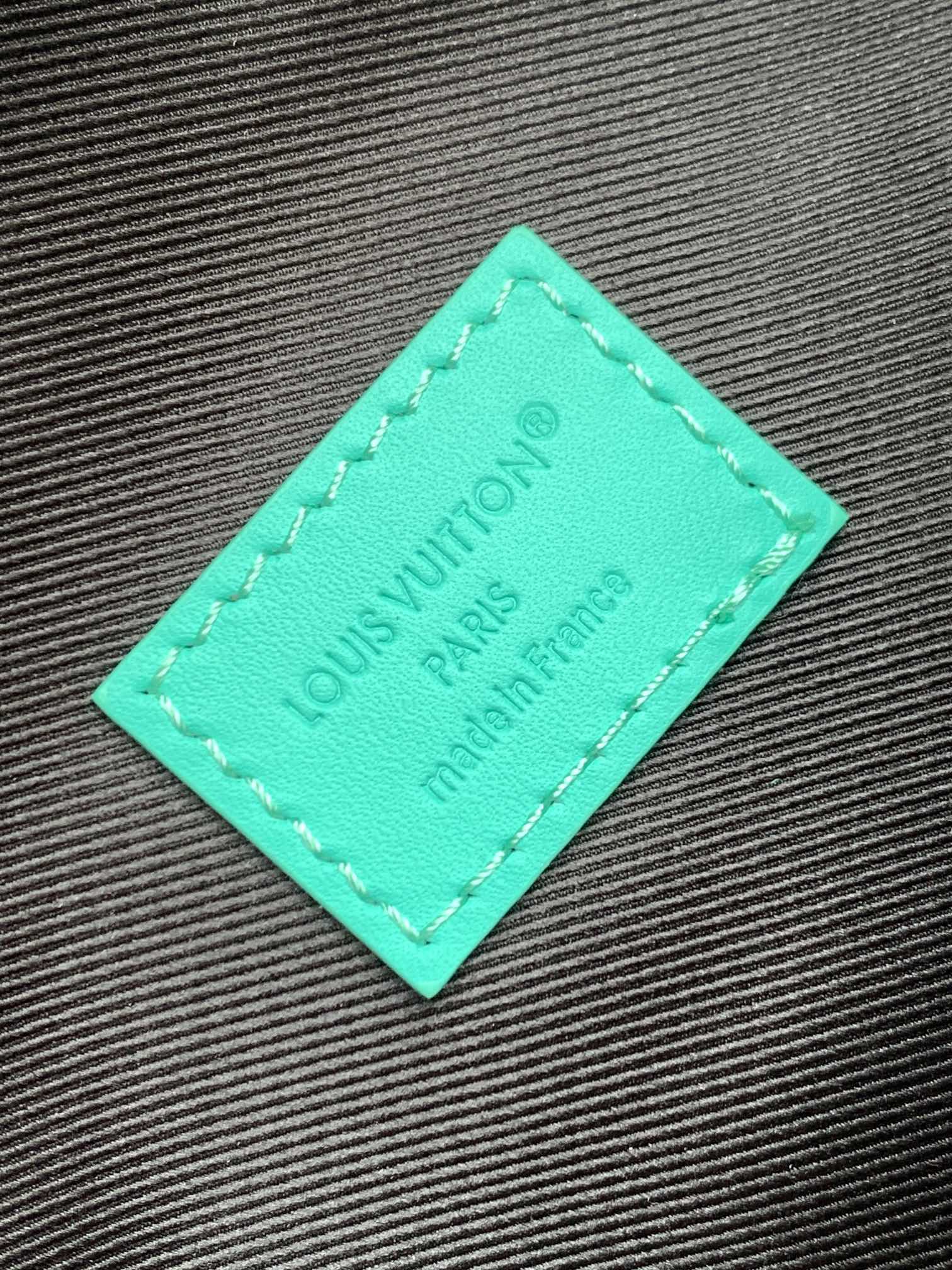 LV 25S DISCOVERY BUMBAG 44 IN BLACK AQUA MONOGRAM ECLIPSE CANVAS AND CALFSKIN
