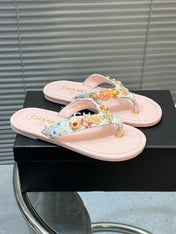THONG SLIPPERS IN LIGHT PINK SOFT LEATHER WITH LOGO STICKER DETAIL