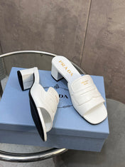 PRADA 26S BLOCK HEEL SLIDE SANDALS 60MM IN WHITE CALFSKIN WITH LOGO