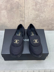 CHANEL 26S LOAFERS IN BLACK CANVAS WITH QUILTED FLAP & CHAIN CC LOGO