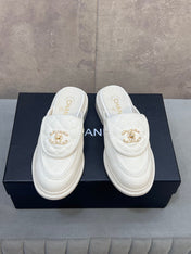 CHANEL 26S MULE LOAFERS IN WHITE CANVAS WITH QUILTED FLAP & CC LOGO