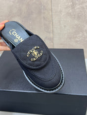 CHANEL 26S MULE LOAFERS IN BLACK CANVAS WITH QUILTED FLAP & CHAIN CC LOGO