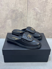 CHANEL 26S MULE LOAFERS IN BLACK QUILTED CALFSKIN WITH CC LOGO