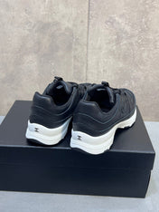 CHANEL 26S RUNNER CC LOGO SNEAKERS IN BLACK CALFSKIN