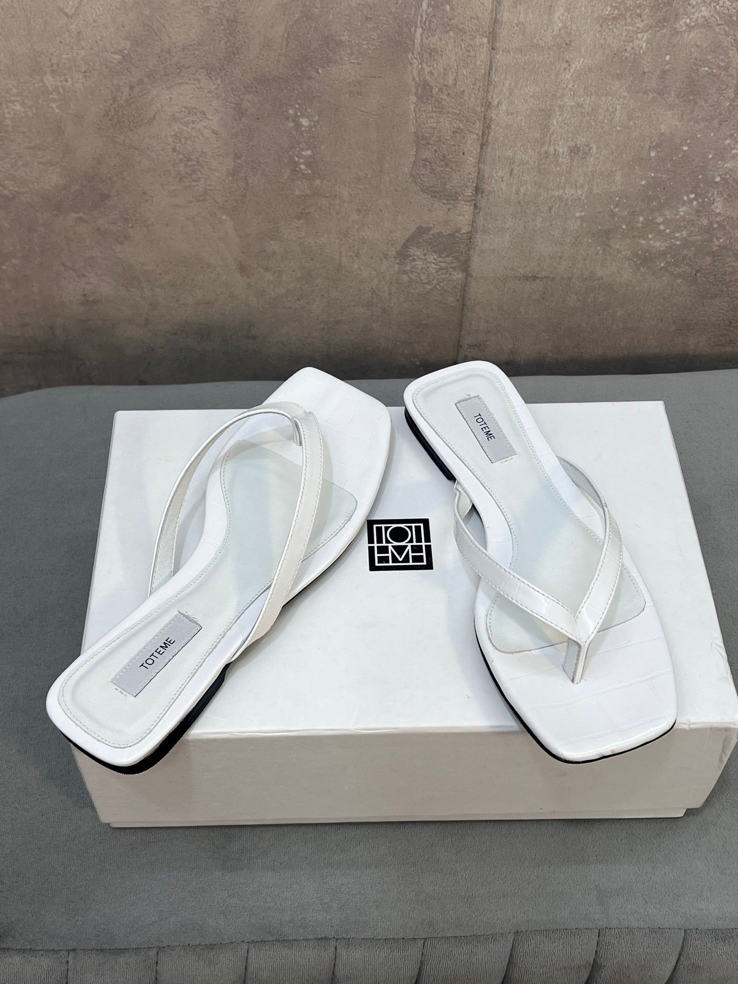 THE ROW 26S SQUARE TOE THONG SANDALS IN WHITE CROCODILE EMBOSSED CALFSKIN