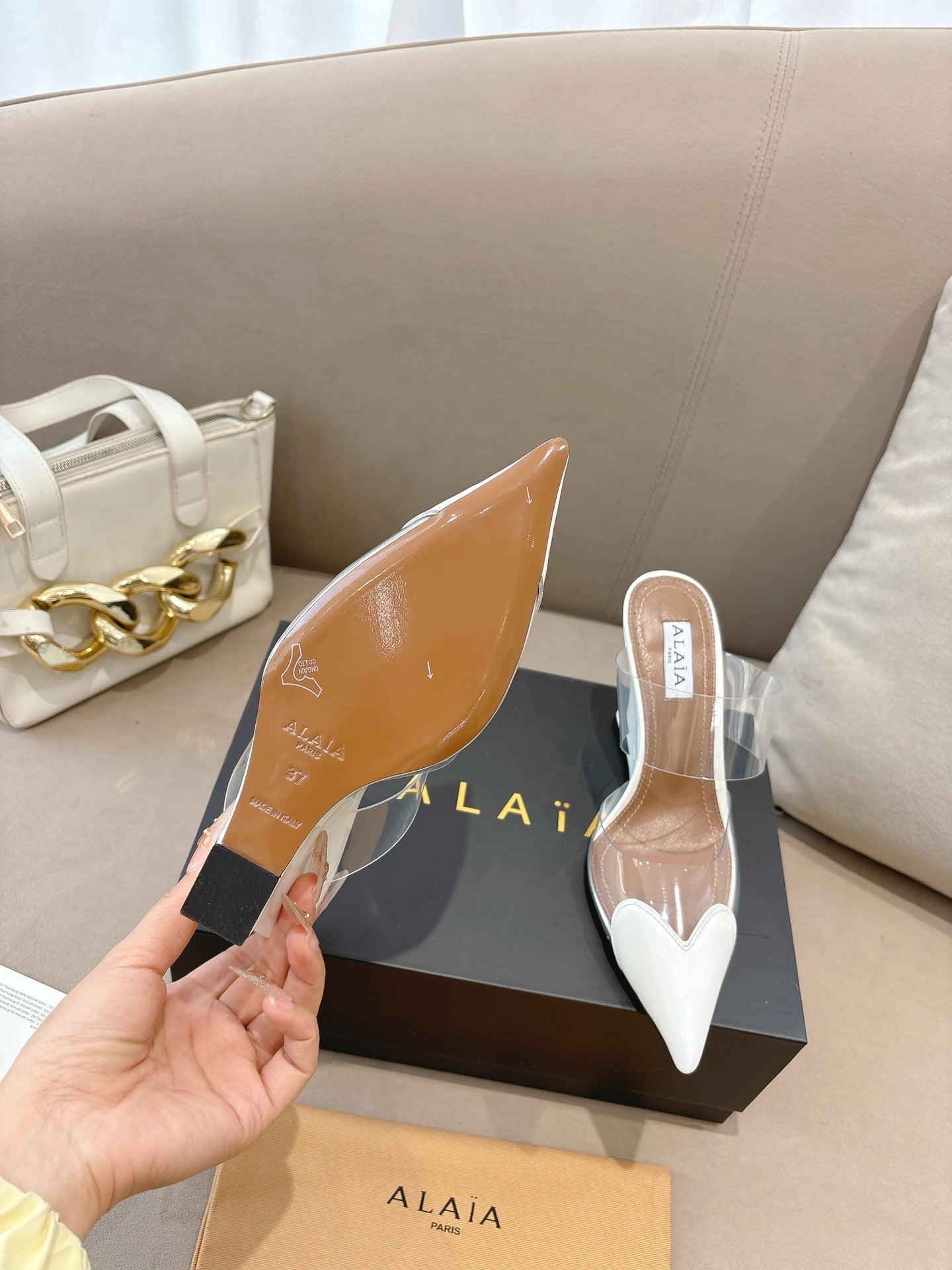 ALAIA 26S HIGH-HEEL WEDGE MULES 95 MM IN WHITE GLOSSY CALFSKIN