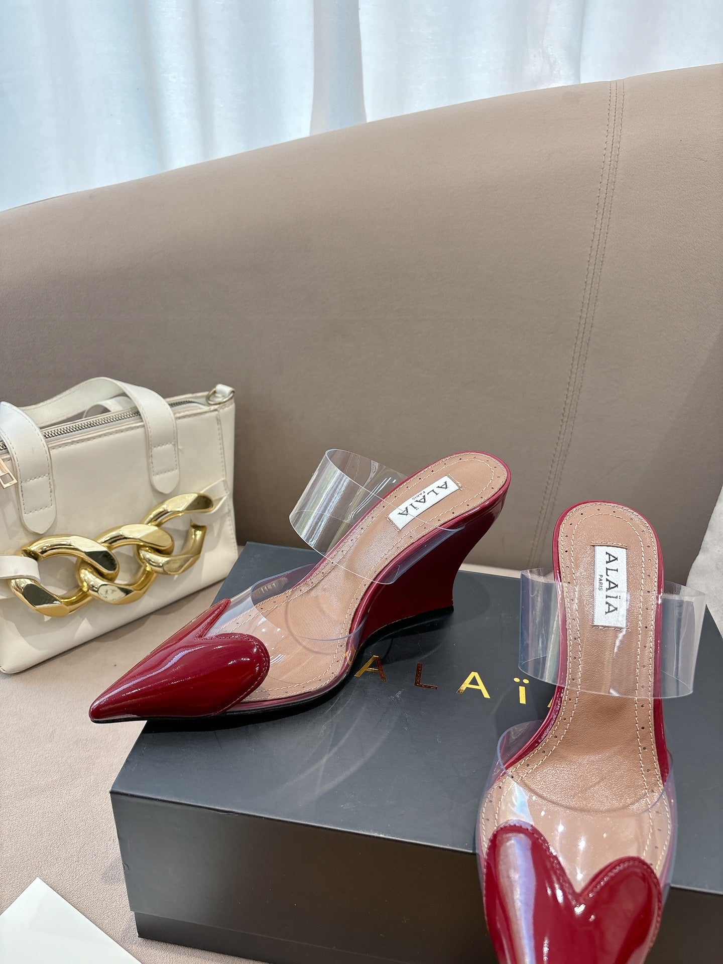 ALAIA 26S HIGH-HEEL WEDGE MULES 95 MM IN DARK RED GLOSSY CALFSKIN