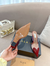 ALAIA 26S HIGH-HEEL WEDGE MULES 95 MM IN DARK RED GLOSSY CALFSKIN