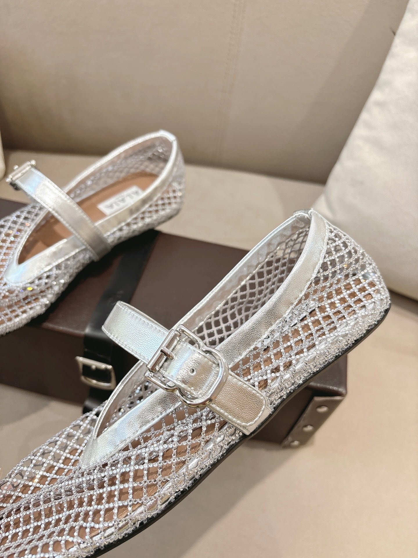 ALAIA 26S MESH FLATS IN SILVER LAMBSKIN