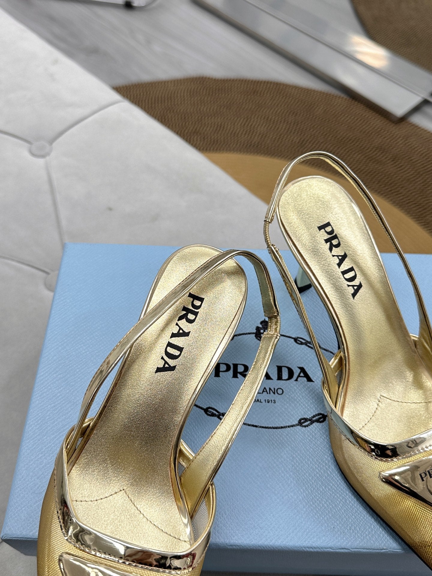 PRADA 25S TRIANGLE LOGO SLINGBACK PUMPS IN GOLD MESH FABRIC