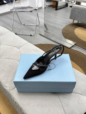PRADA 25S TRIANGLE LOGO SLINGBACK PUMPS IN BLACK MESH FABRIC