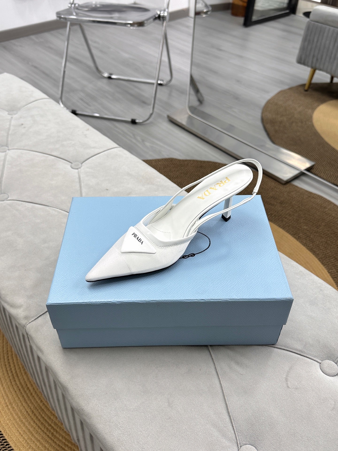 PRADA 25S TRIANGLE LOGO SLINGBACK PUMPS IN WHITE MESH FABRIC