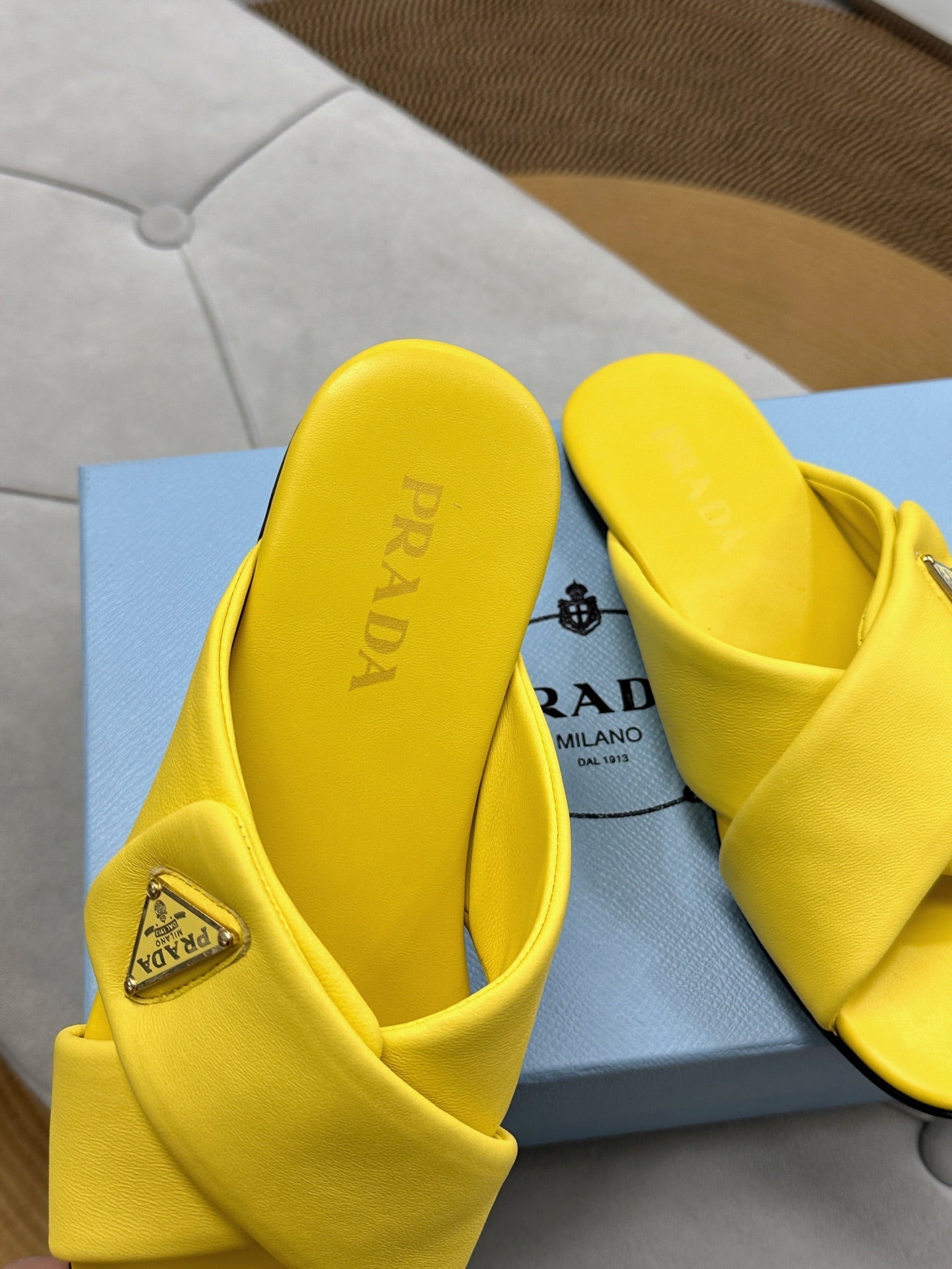 PRADA 25S SLIDE SANDALS IN YELLOW CALFSKIN LOGO
