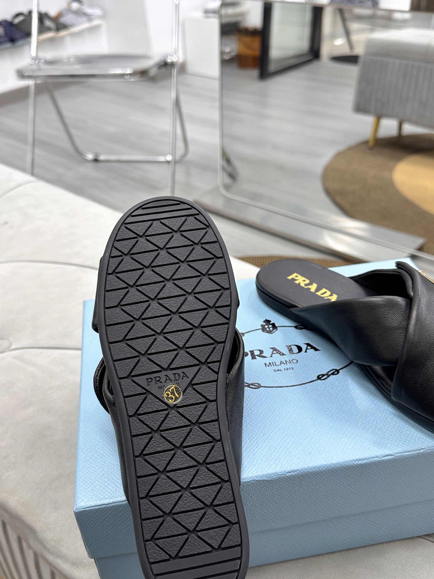 PRADA 25S SLIDE SANDALS IN BLACK CALFSKIN LOGO