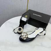 CHANEL 26S CAMELLIA PEARL SLINGBACKS IN BLACK CALFSKIN