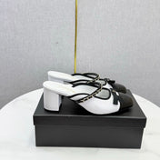 CHANEL 26S HIGH HEEL MULES 45 MM IN WHITE AND BLACK LAMBSKIN