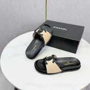 CHANEL 26S ICONIC CC SLIDES IN BEIGE LAMBSKIN