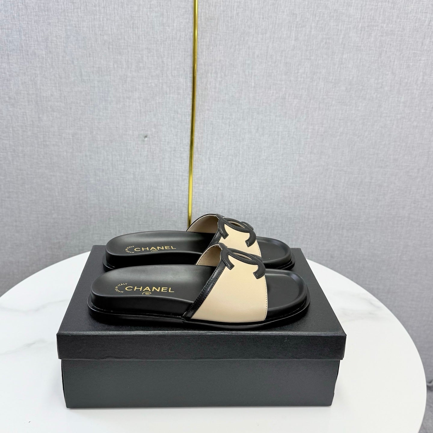 CHANEL 26S ICONIC CC SLIDES IN BEIGE LAMBSKIN