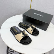 CHANEL 26S ICONIC CC SLIDES IN BEIGE LAMBSKIN