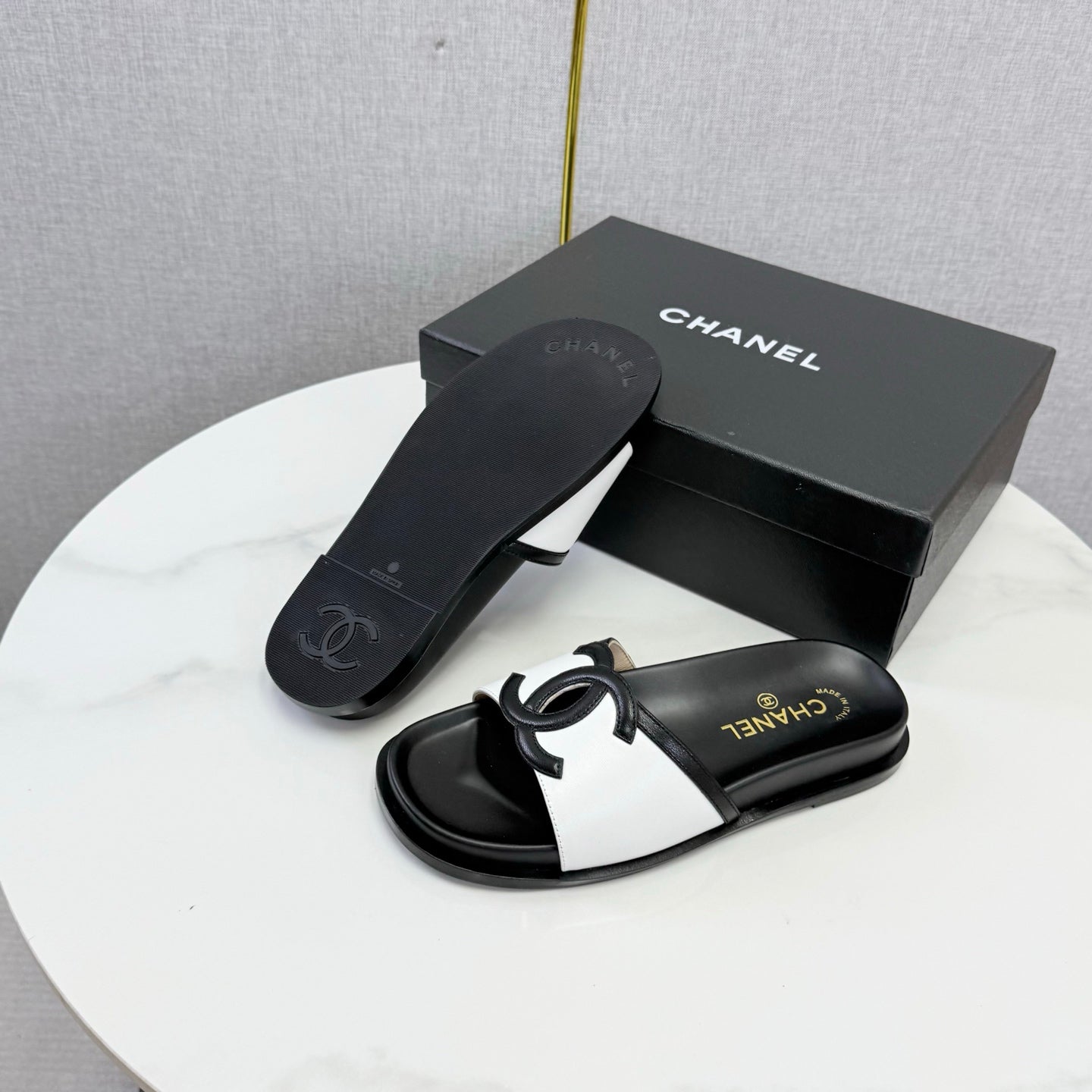 CHANEL 26S ICONIC CC SLIDES IN WHITE LAMBSKIN