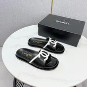 CHANEL 26S ICONIC CC SLIDES IN BLACK LAMBSKIN
