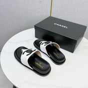 CHANEL 26S CC THONG SLIDES IN WHITE AND BLACK LAMBSKIN
