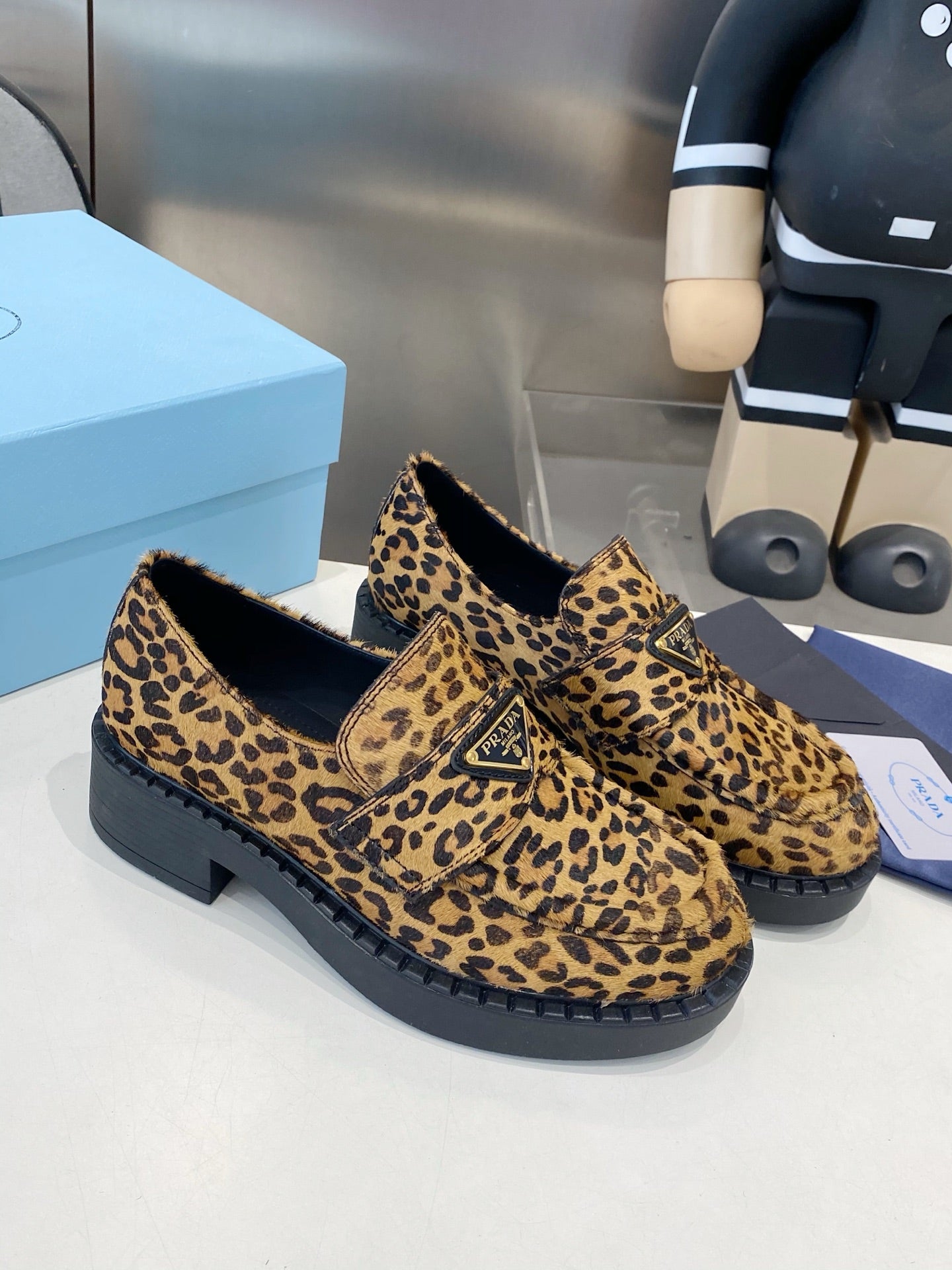 PRADA 26S LOAFERS IN BROWN LEOPARD PRINT PONY HAIR
