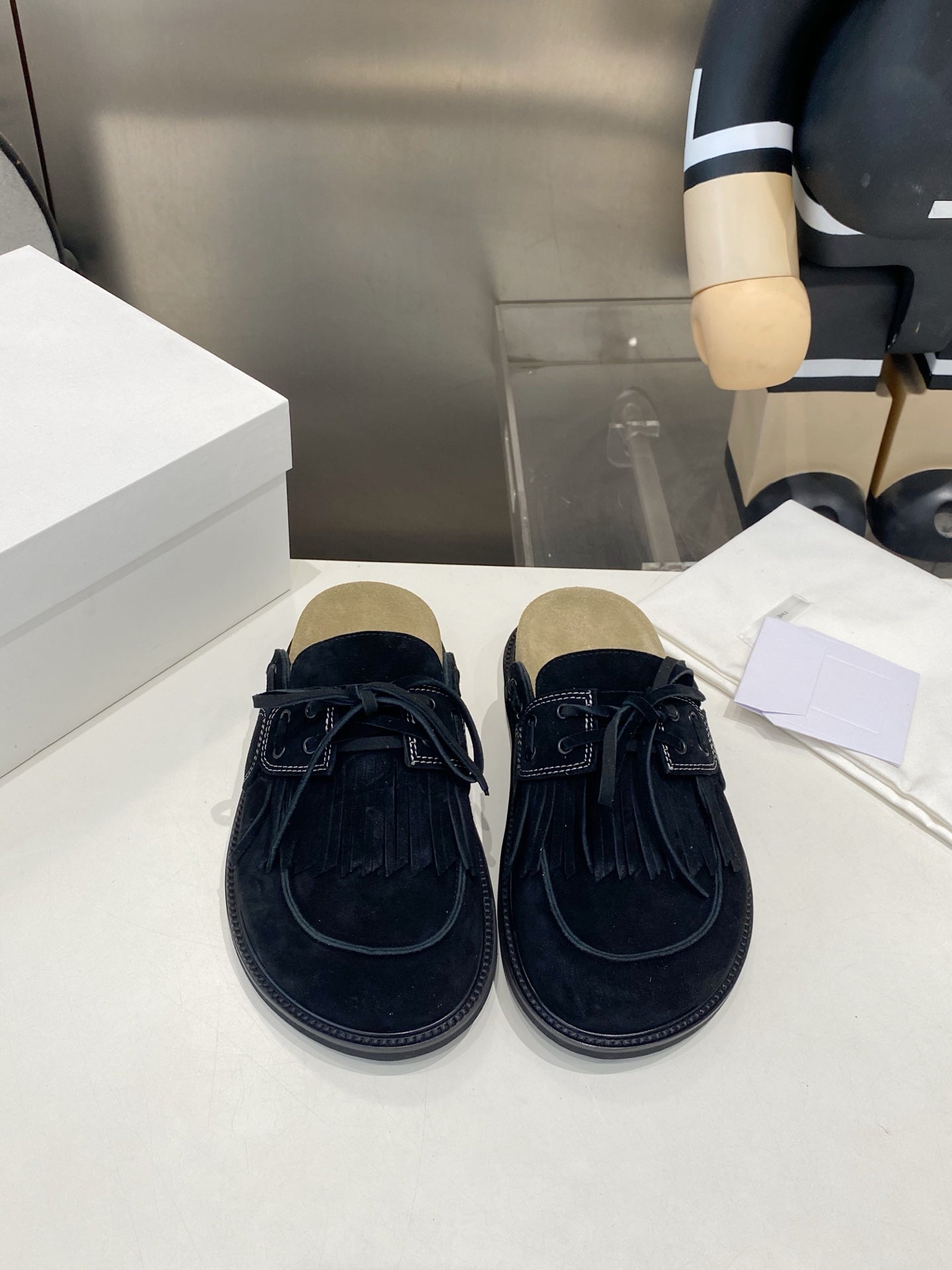 THE ROW 26S FRINGE LACE UP MULES IN BLACK SUEDE