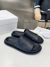 THE ROW 26S MULTI STRAP SLIDES IN BLACK CALFSKIN