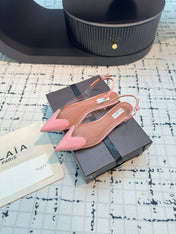 ALAIA FLAT SLINGBACK IN ROSE PINK PATENT CALFSKIN AND FILM