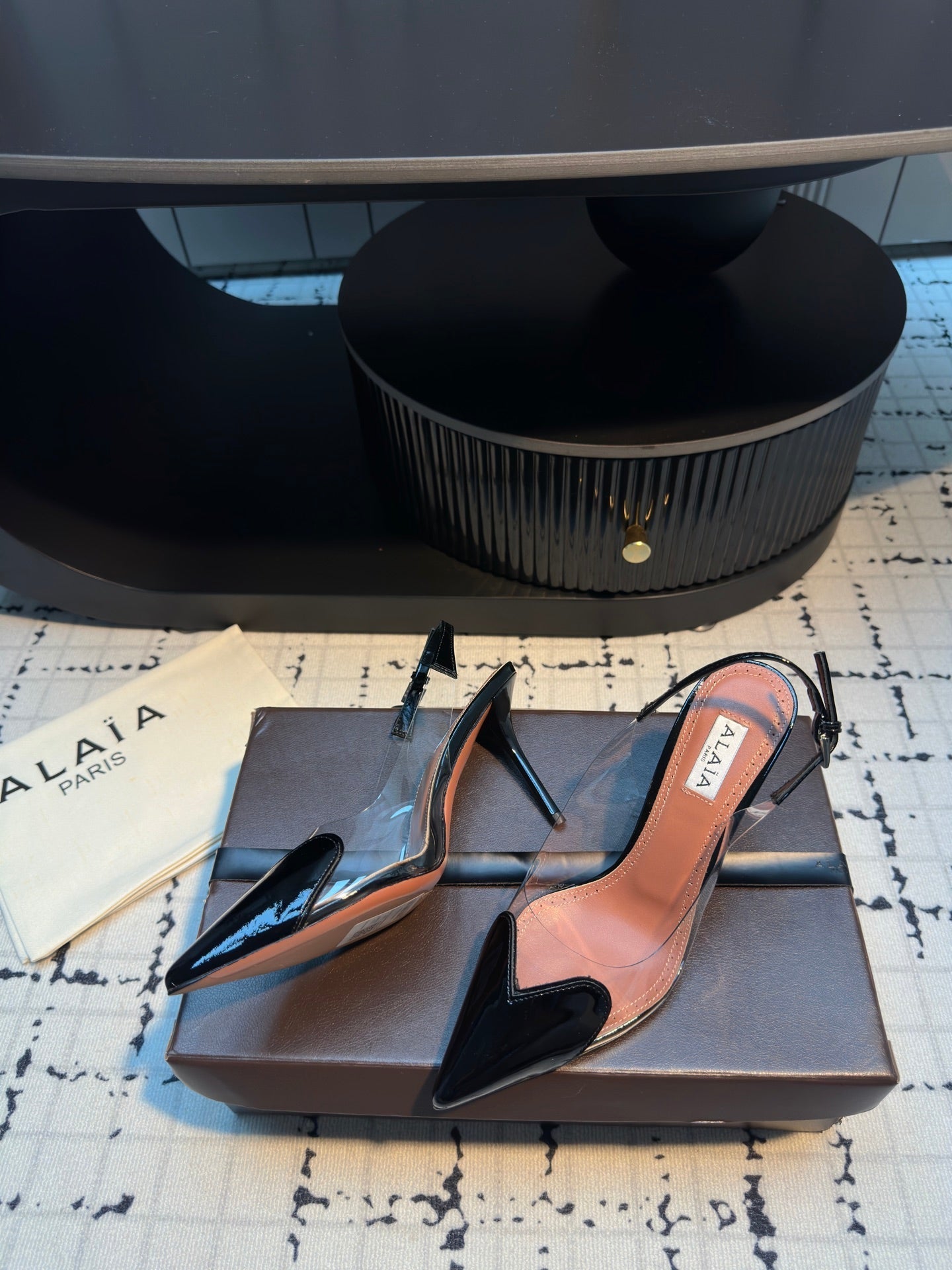 ALAIA HIGH SLINGBACK 25S 90 MM IN BLACK CALFSKIN