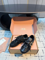 MIUMIU 26S LACE UP SNEAKERS IN BLACK CALFSKIN BUCKLE STRAP DETAIL