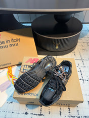 MIUMIU 26S RUNNING SNEAKERS IN BLACK CALFSKIN AND MESH RUBBER SOLE